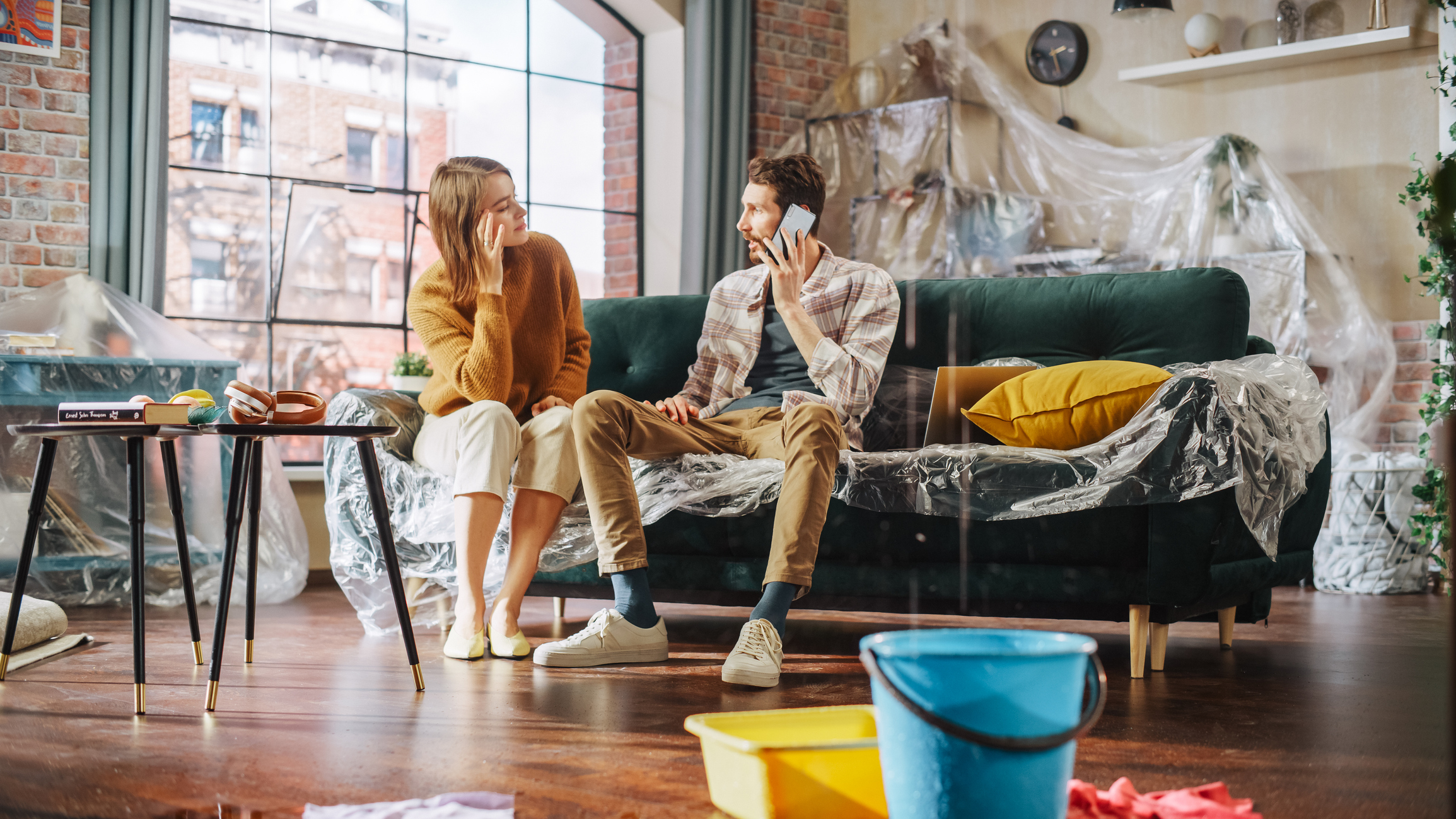 Couple seating on a sofa