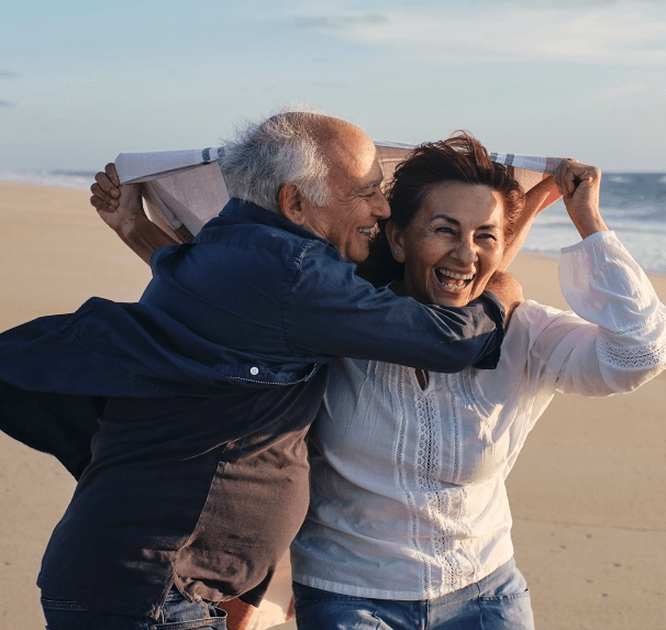 A senior couple feeling secure under payout annuities coverage