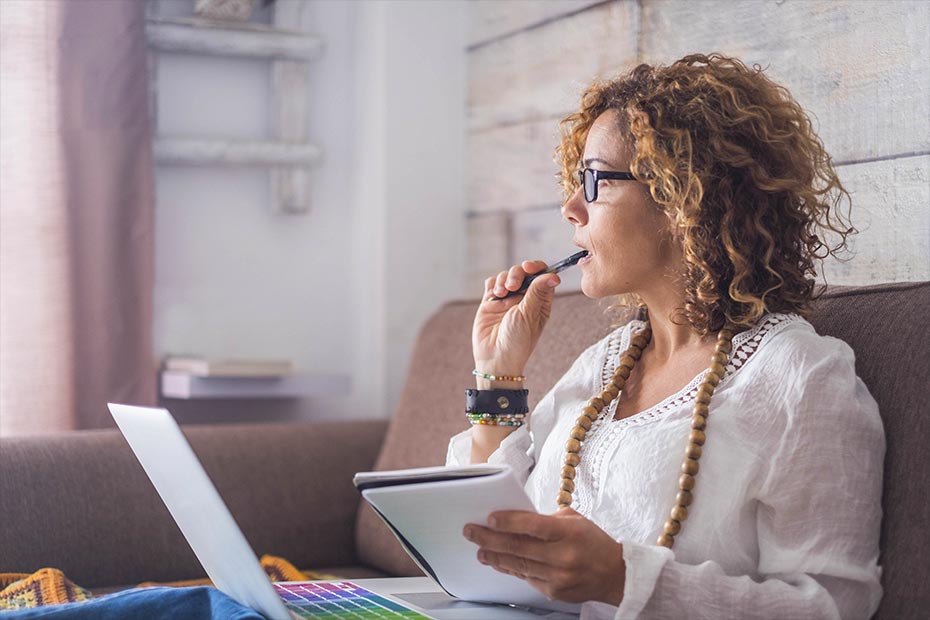 A woman thinking about how much life insurance she needs