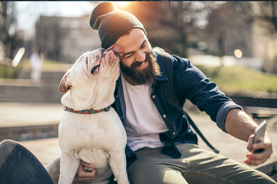 A man and a dog.