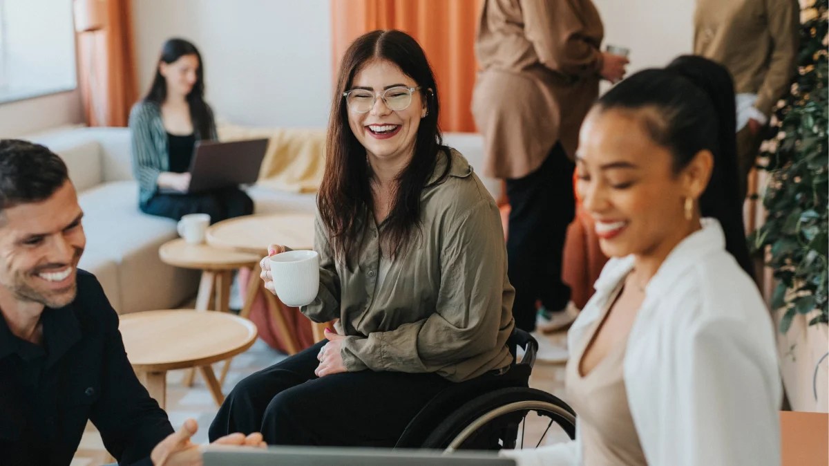 Employee in a wheelchair reviewing her Group Benefits coverage